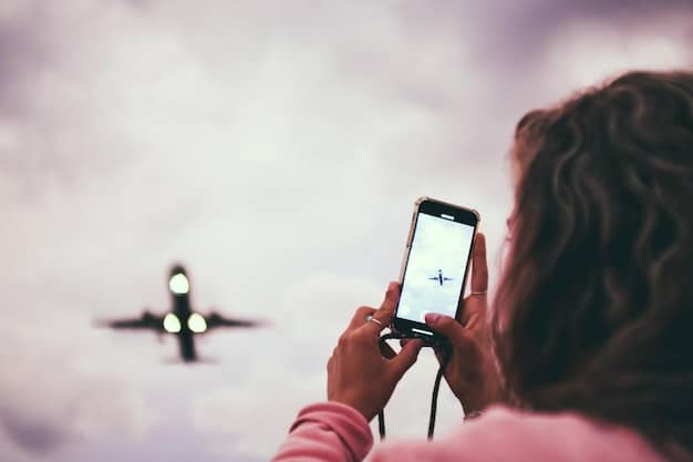 A close-up of a smartphone displaying a downloaded episode on a streaming app, with airplane mode activated.