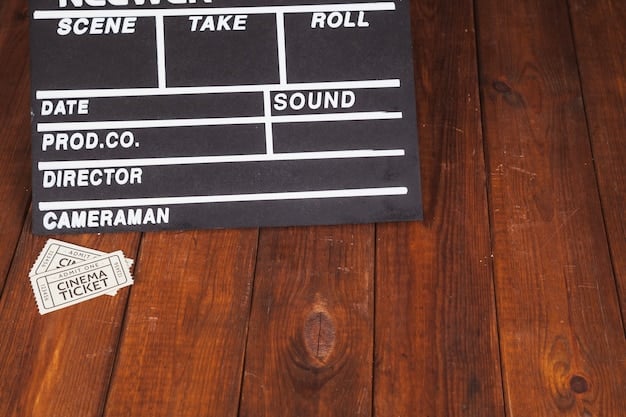 Close-up of a film slate with the director's name and scene number prominently displayed. The focus is sharp on the details of the text, while the background remains slightly blurred, putting emphasis on the information provided on the slate.