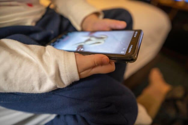 A person holding a smartphone displaying a movie review on Twitter with various comments and likes. The image showcases the influence of social media reviews at a glance.