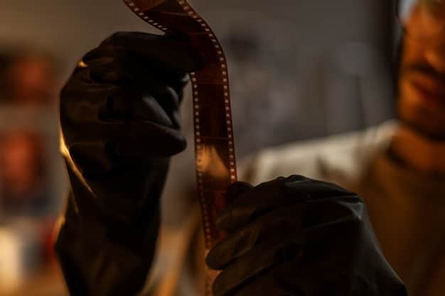 A close up shot focusing on the editor's hands meticulously splicing film reels together using traditional editing equipment, showcasing the precision and tactile nature of the editing process.