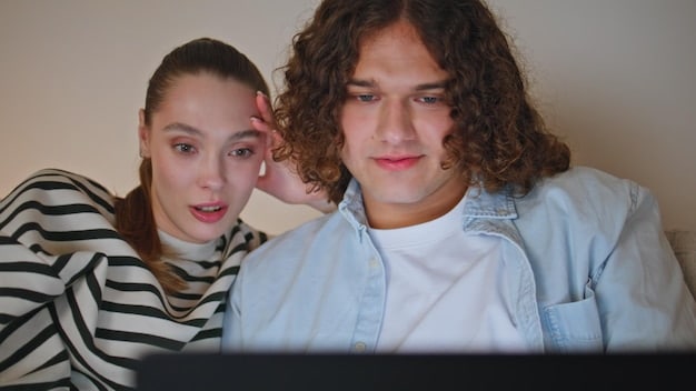 A picture capturing the intensity between Maddy (Alexa Demie) and Nate (Jacob Elordi) from Euphoria Season 2 during a heated confrontation. Their expressions should convey anger, resentment, and a complex history of love and conflict, set against a dimly lit, dramatic backdrop.