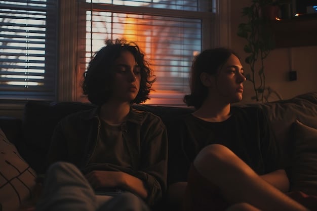 A wide shot of Rue, Jules, and Elliot sitting together in a dimly lit room, looking uncomfortable and distant from each other. The scene captures the tension and ambiguity of their relationship.