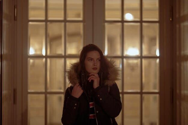 Rue (Zendaya) facing Jules (Hunter Schafer), in a dimly lit room, the atmosphere thick with tension and unspoken emotions. Rue appears distressed and withdrawn, highlighting the strain addiction places on their relationship and showcasing the emotional distance created by Rue's struggles.