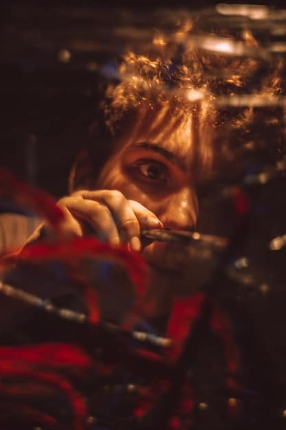 A still from Euphoria season 2 showing Rue in the midst of a drug-induced high, eyes wide and unfocused, surrounded by chaotic visuals.