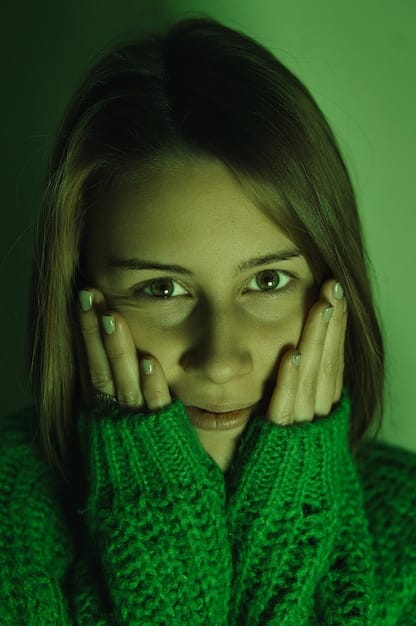 A close-up shot of Whitney's face, illuminated by the harsh artificial light of her home. Her expression is a mix of shock, horror, and potential guilt.