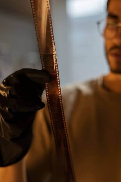 A close-up of film reels with a warm, nostalgic glow, emphasizing the artistry and craftsmanship involved in independent filmmaking. The background is blurred, focusing on the tangible aspect of cinema.