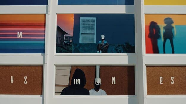 A collage featuring the posters for three iconic films rumored to be getting remakes in 2025. Each poster should be visually distinct, representing different genres and styles, and accompanied by a caption indicating 
