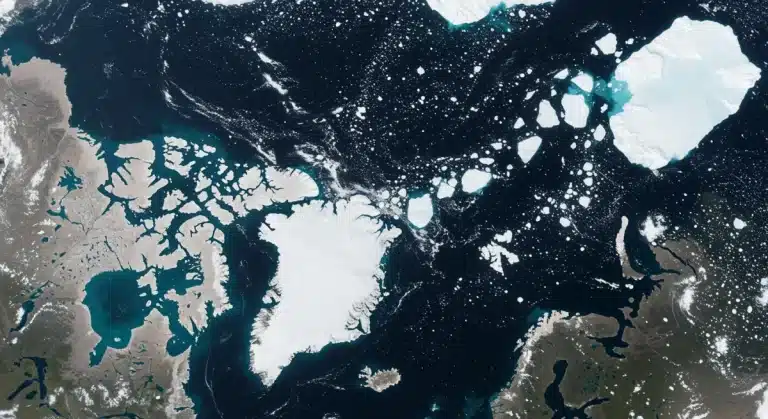 Satellite view of significant Arctic ice loss, showing fragmented ice and open water